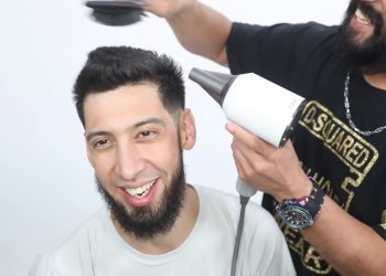 Mid to low Fade Haircut Tutorial featuring Johnee Livingston